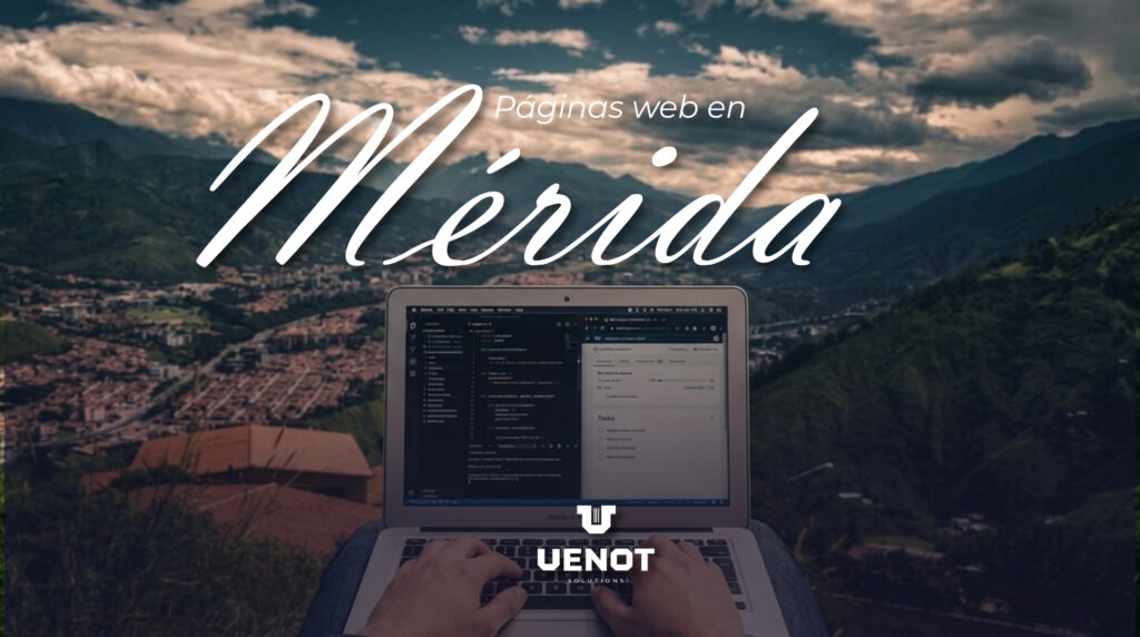 Primer plano de un desarrollador escribiendo código en una laptop con vistas a la ciudad de Mérida, Venezuela, destacando el servicio de creación de páginas web en Mérida por Venot Solutions.